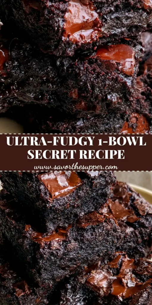 A stack of thick, fudgy Zucchini Brownies with a shiny crinkle top and visible chocolate chunks on a cream plate.